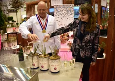Cook Theo Clevers and grower Willianne Sluiter, from Incredible Roses baptizing the rose named The Clevers. 